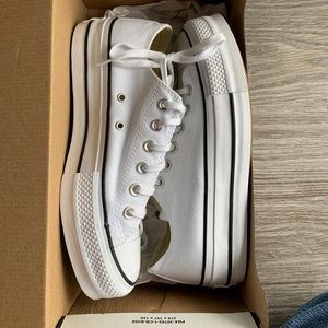 white platform converse